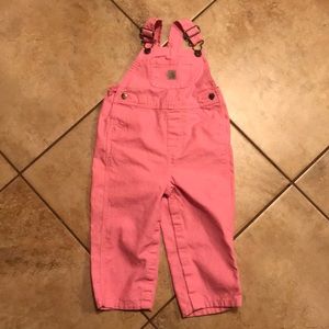 Pink carhartt bibs.